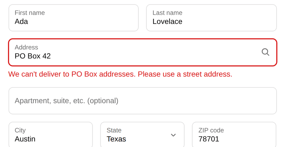 A PO Box address blocked at checkout, the error pinned to the address field